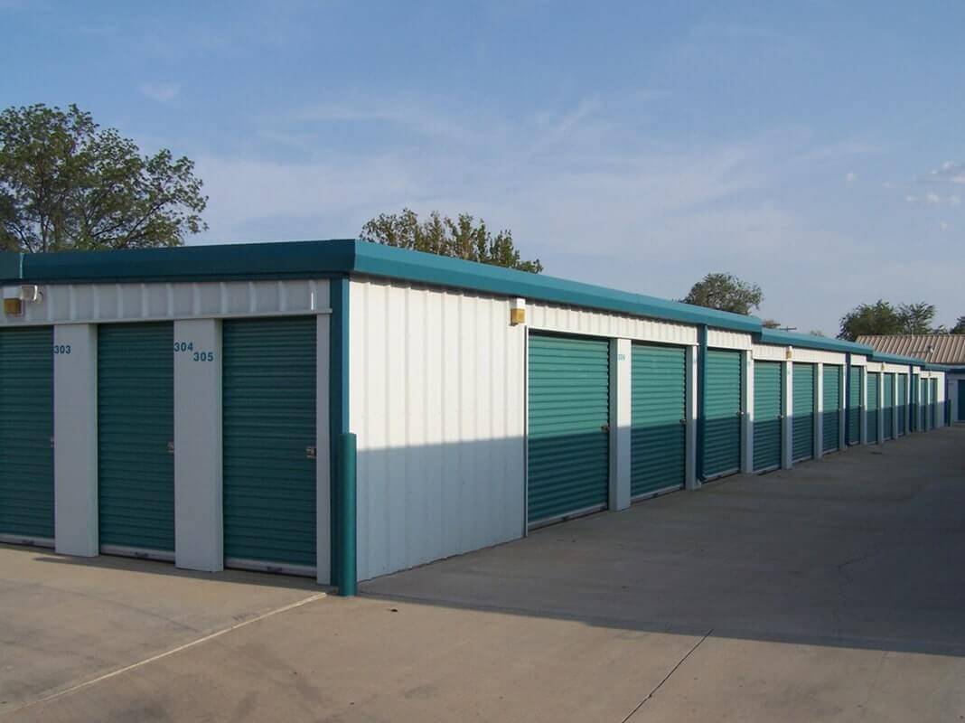 American Steel Buildings - Storage Unit Building with Green Trim and Green Doors American Steel Buildings - Storage Unit Building with Green Trim and Green Doors